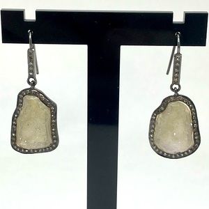 A one of a kind pair of diamond and druzy geode earrings